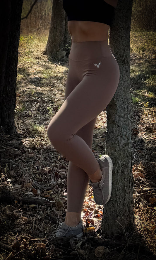 Woman wearing black high-performance squat-proof leggings for gym workouts